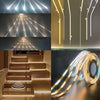 Tiras LED dinámicas tipo COB para pasillos, escaleras y recibidores. Control mediante sensores o interruptores de efecto running water 